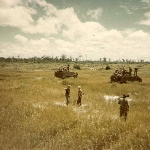 46 2 guys in a field talking