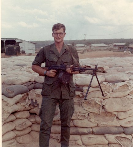 Peter Langlois with AK 47